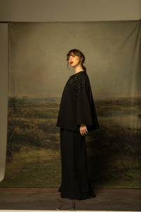 Lia Cohen is a brand of elevated day dressing. Our photo reflects a modern woman in a baroque environment wearing a hand made by women. Our prints are made in house as well as all the embroidery by our lady team.   We decided to create an environment in the photo that reflects our collection that talks about integration between our light and our shadows.